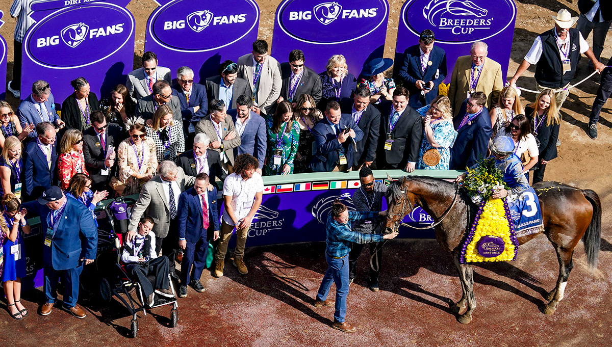 Cody Dorman joins Cody's Wish in the winner's circle of the Breeders' Cup Dirt Mile